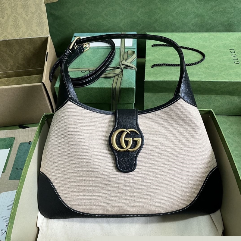 G*u*i top handle bags